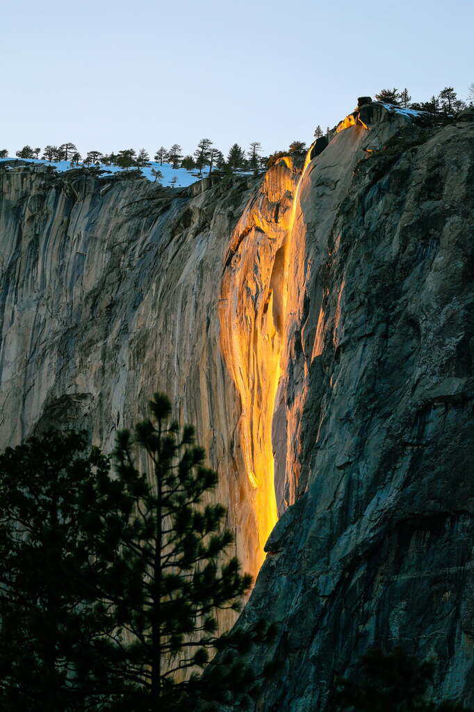 A picture of the yellow glow of firefall in Yosemite National Park