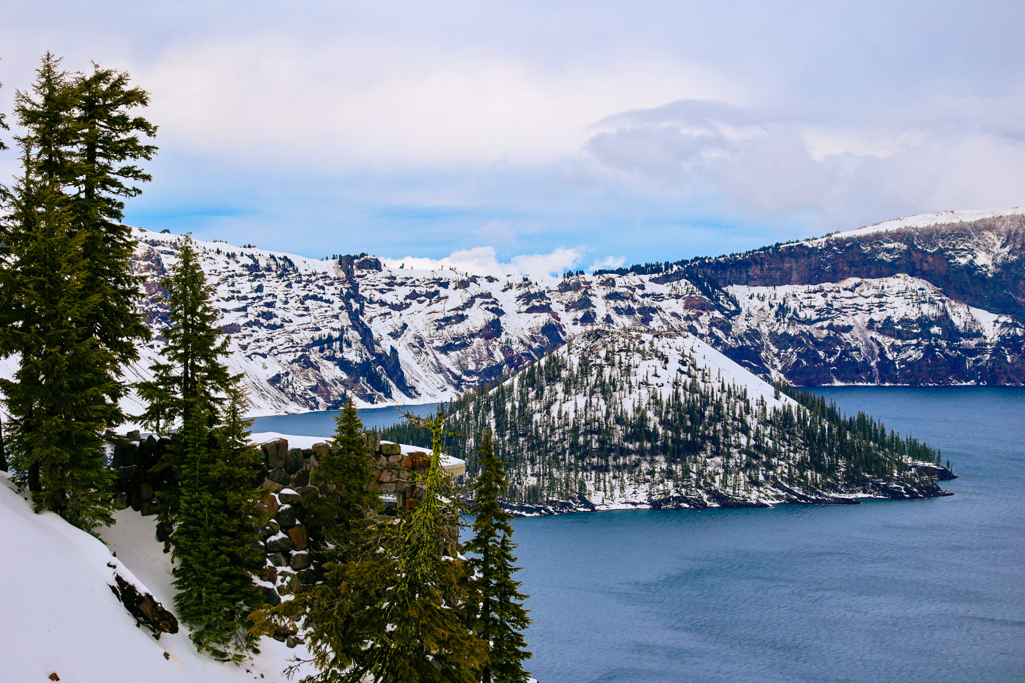 Wizard Island and Crater lake national park in the snow.