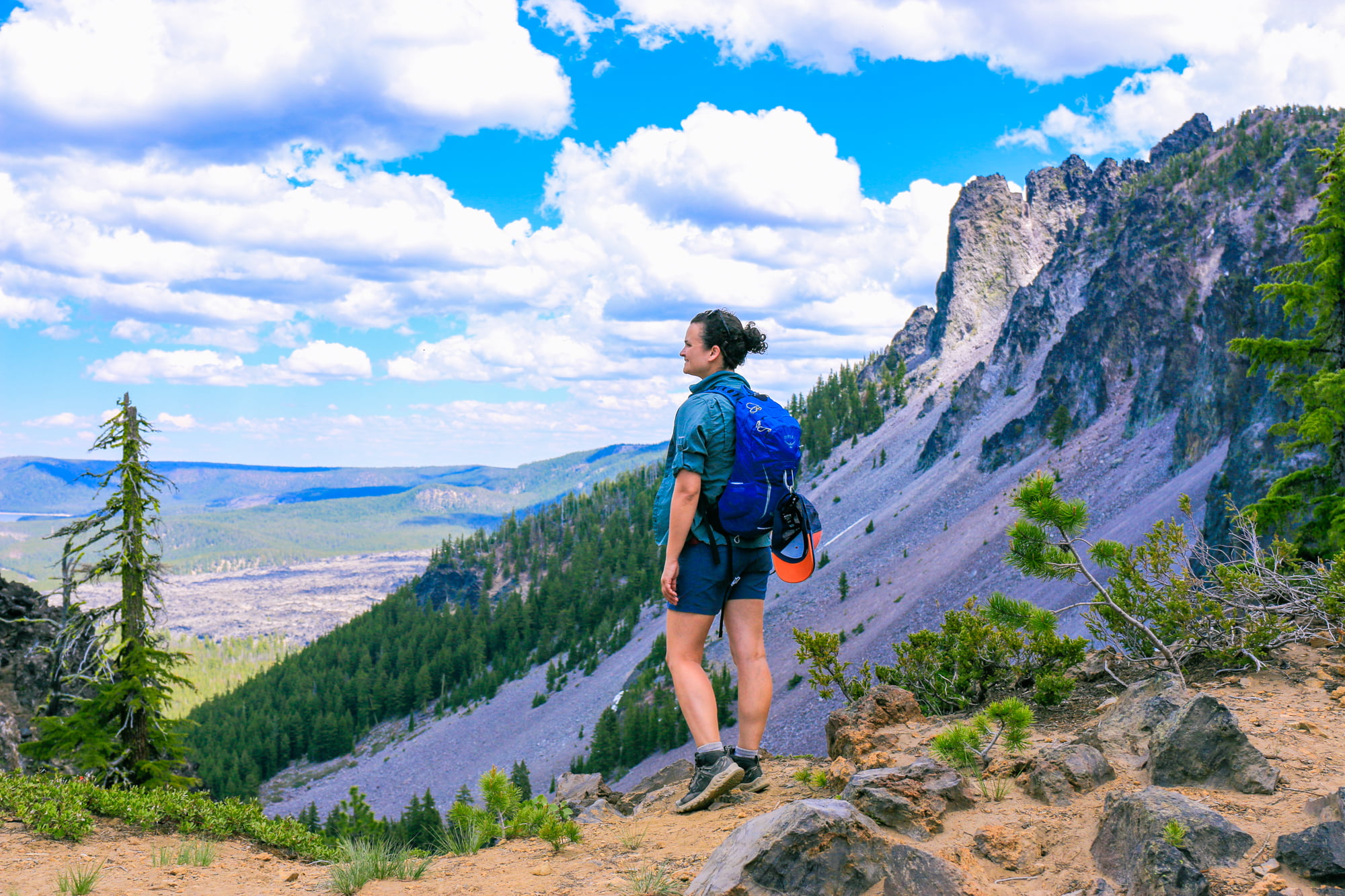 A women hiking at Newberry national monument in Bend, Oregon. Visiting Newberry National Volcanic Monument: two day summer Itinerary