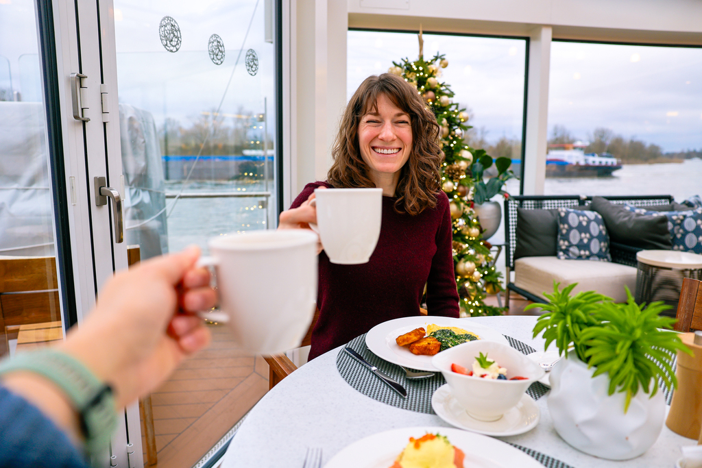 Enjoying breakfast on the aquavit terrace on a viking river cruise. This was a Christmas river cruise on the Rhine. 