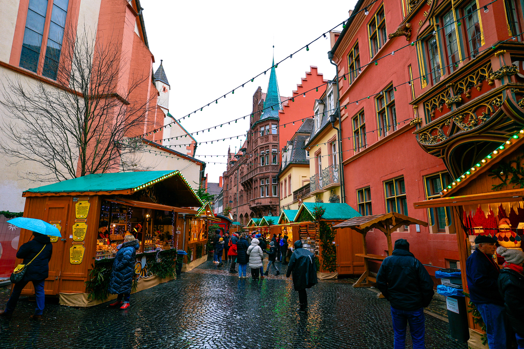Festive Christmas markets of Freiburg Germany in the rain