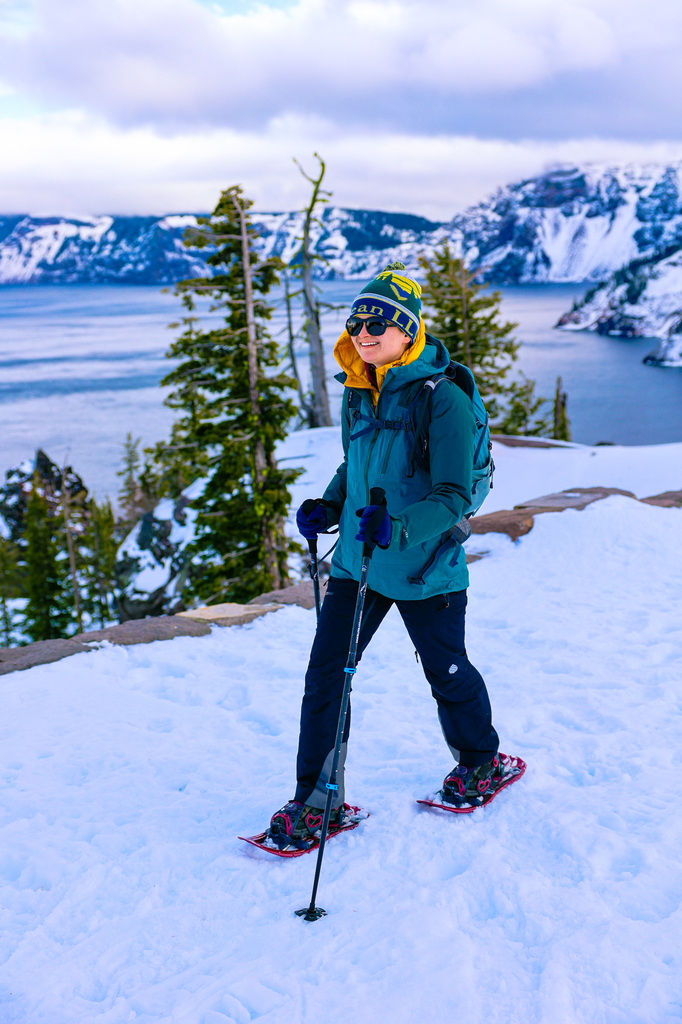 Amiana snowshoeing at crater lake. Visiting crater Lake National Park in winter.