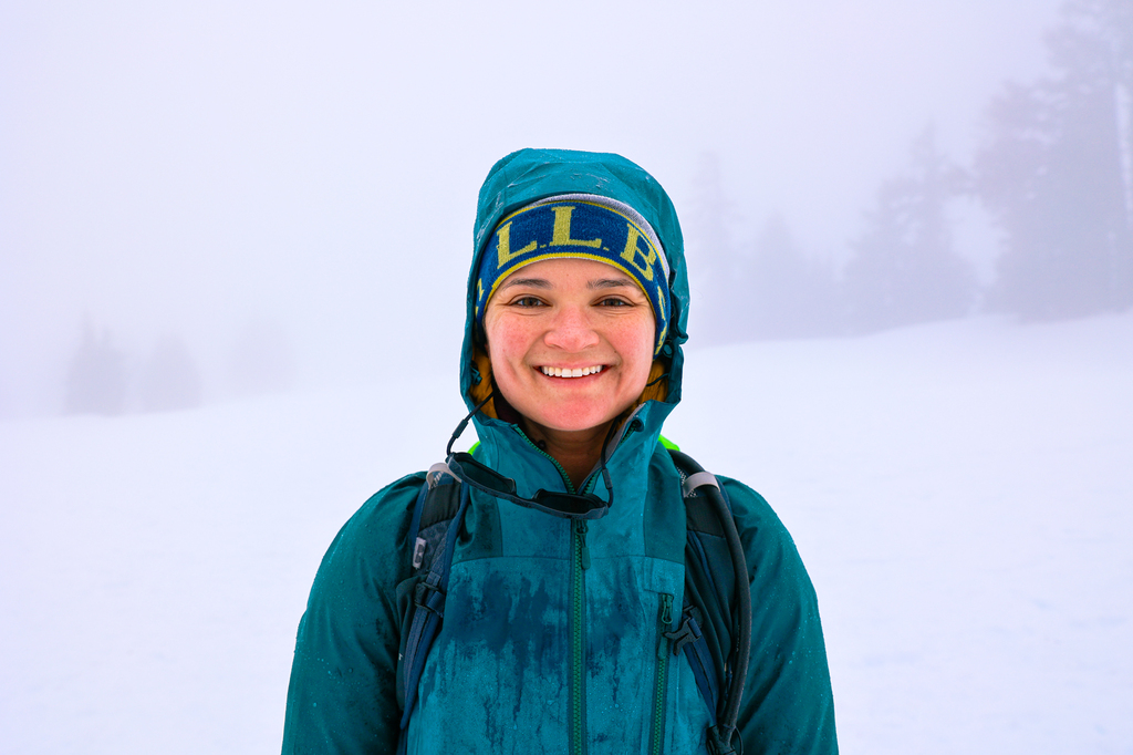 Amiana standing in the mist at crater Lake. Visiting crater Lake National Park in winter.