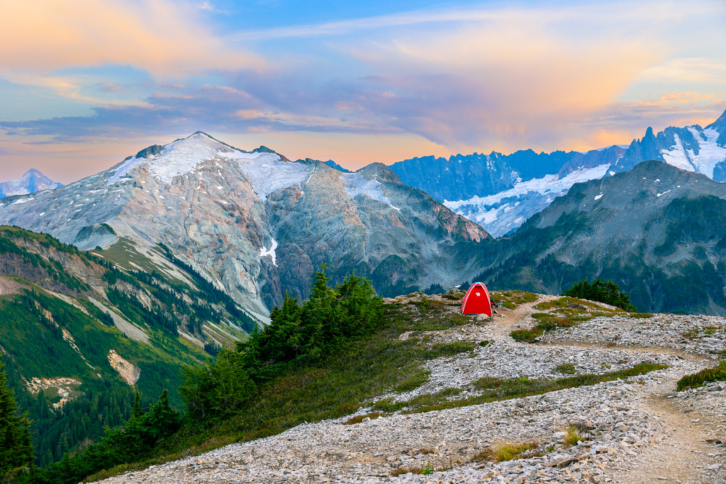 Backpacking at the top of Hannegan peak along the hannegan pass and peak trail in washington with views of mount baker