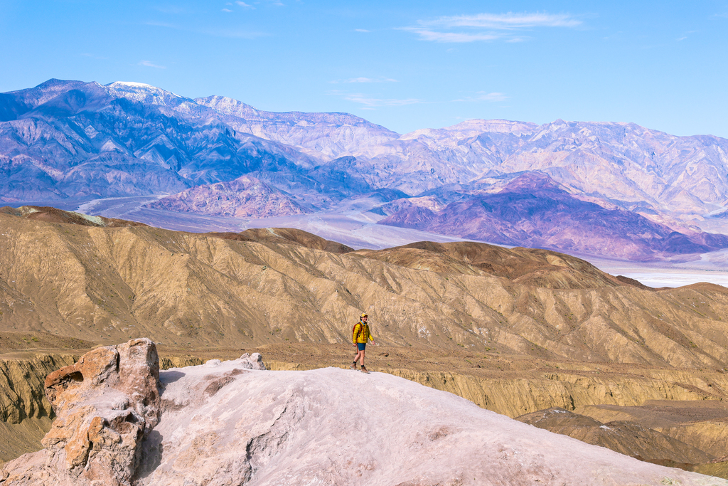 Woman hiking near artists palette in death valley national park