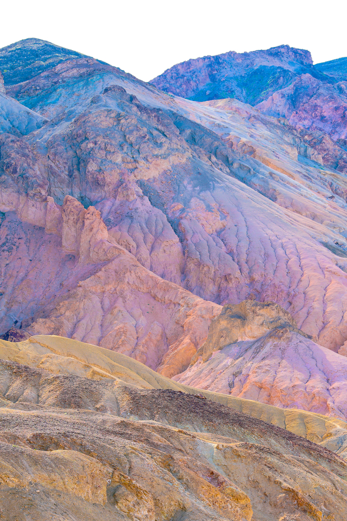 Colorful pink and blue rocks and soil at Artists Palate in Death Valley National Park.