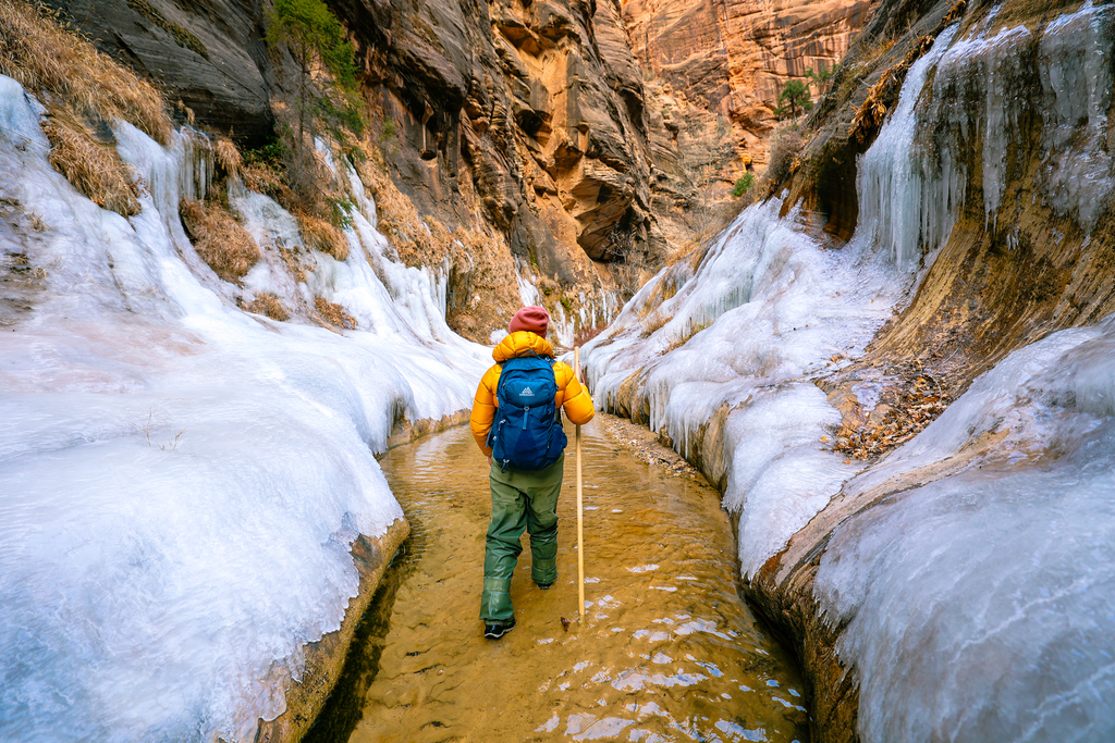 Hiking the narrows in zion in winter with ice