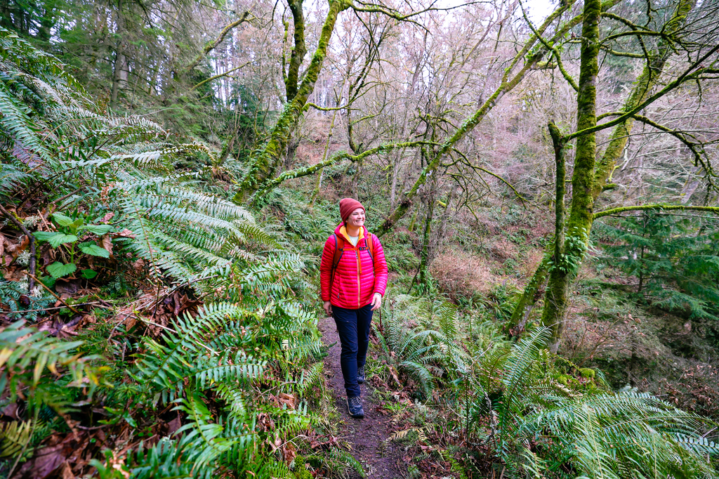 Woman hiking the Possession Point State Park Loop on Whidbey Island