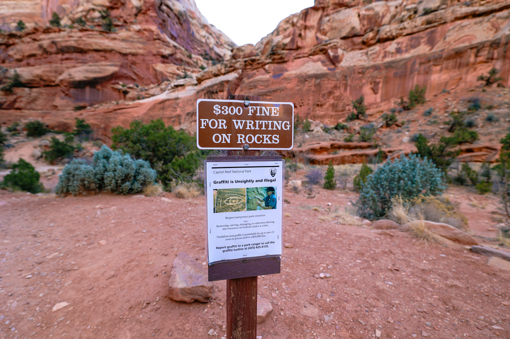 Carving on the rocks at Capitol reef national park
