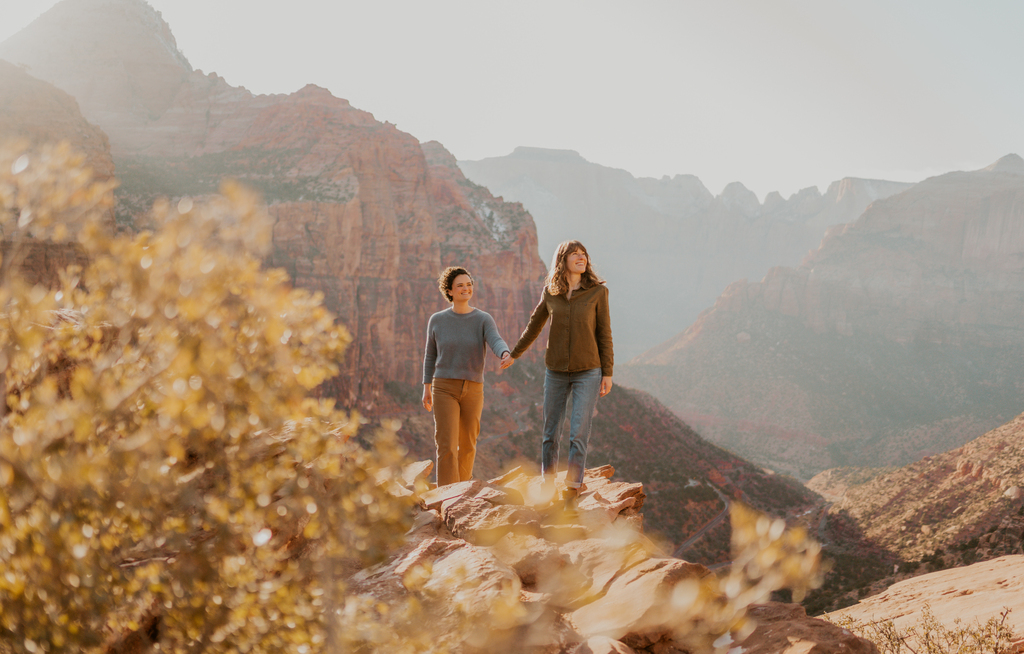 Cute lesbian couple photoshoot in Zion national park at canyon overlook by Zion Adventure Photog