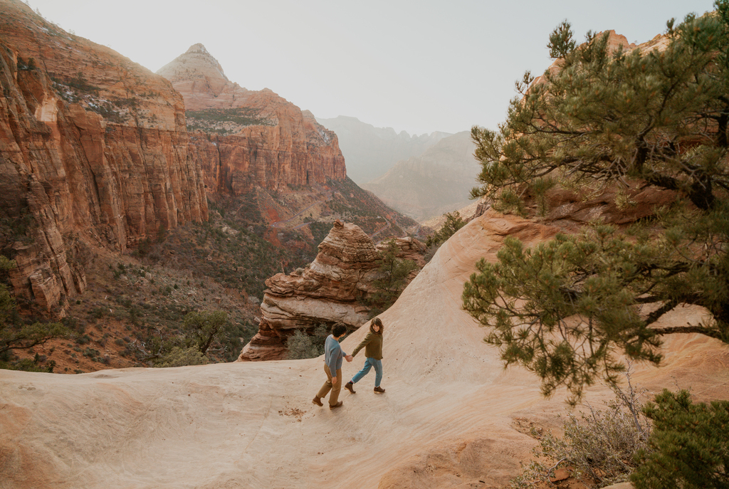 Cute lesbian couple photoshoot in Zion national park at canyon overlook by Zion Adventure Photog
