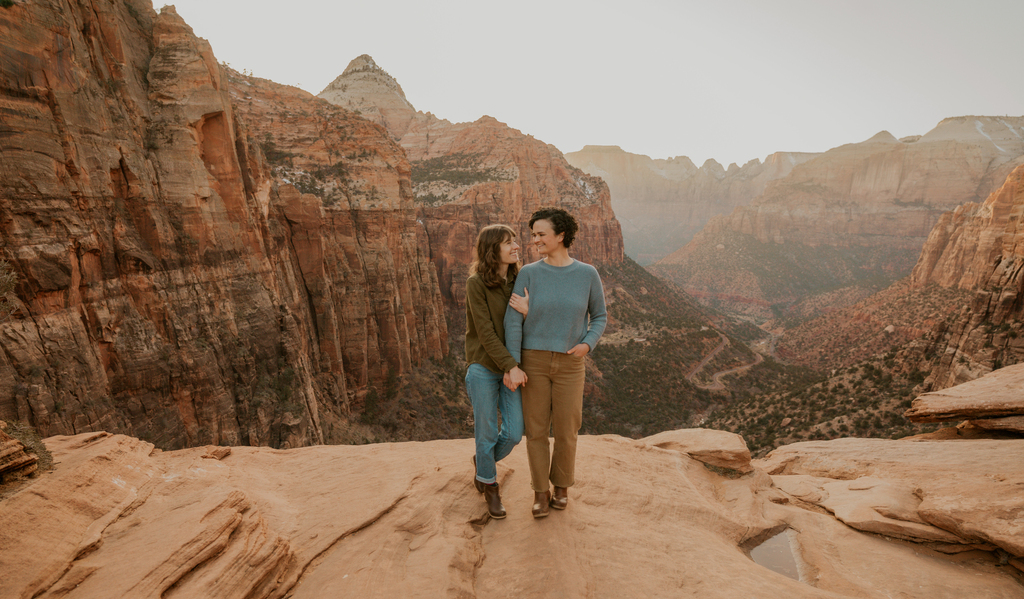 Cute lesbian couple photoshoot in Zion national park at canyon overlook by Zion Adventure Photog