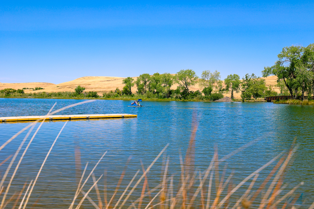 Swim, SUP, or paddle at her­mal­i­to Fore­bays State Recre­ation Area and Forebay Aquatic Center