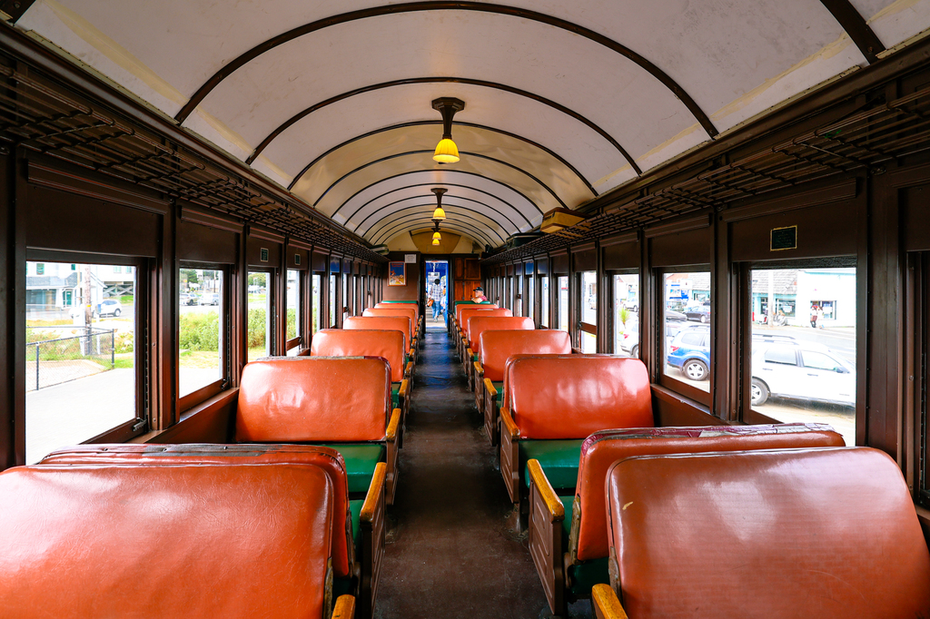 Oregon Coast Scenic Railroad steam engine train ride. Historic train interior.