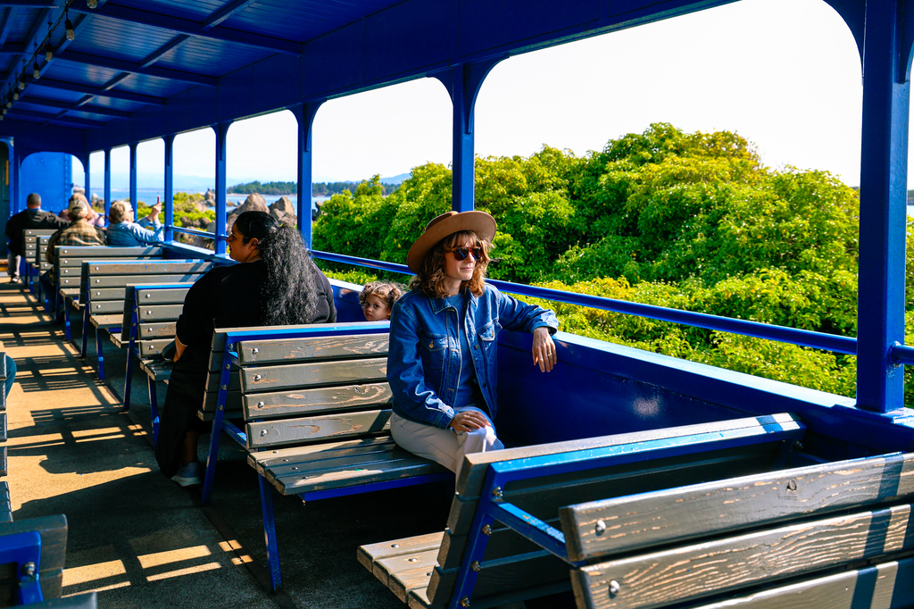 Woman on the Oregon Coast Scenic Railroad steam engine train ride